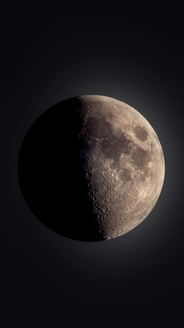 1290x2796 A half moon is seen in the dark sky -  iPhone Wallpaper