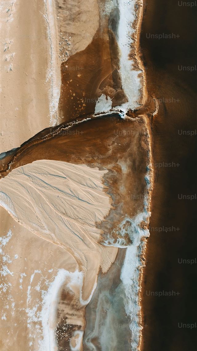 1290x2796 a bird's eye view of a sandy beach -  iPhone Wallpaper