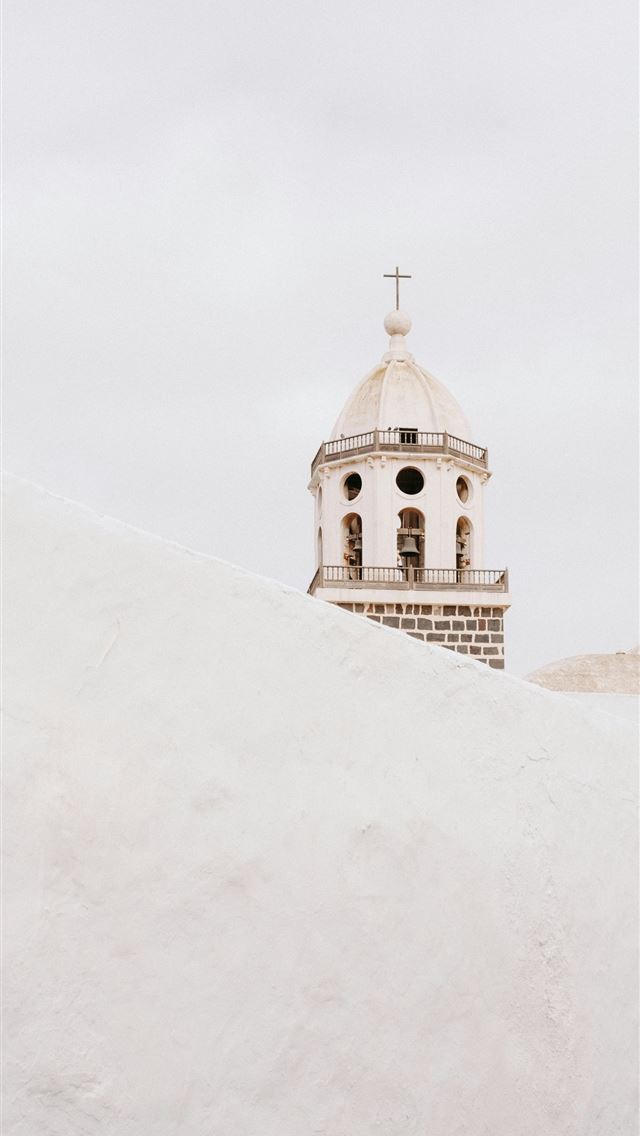 1290x2796 A white building with a bell tower on top of it -  iPhone Wallpaper
