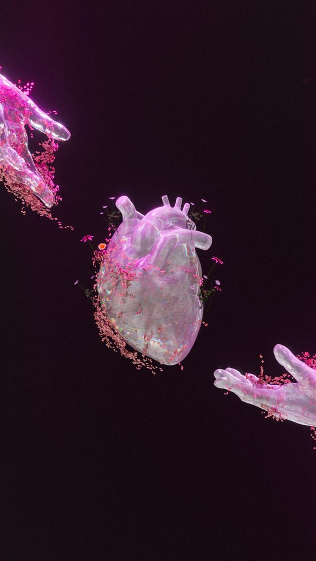 1242x2688 Hands reach for a glowing heart  -  iPhone Wallpaper