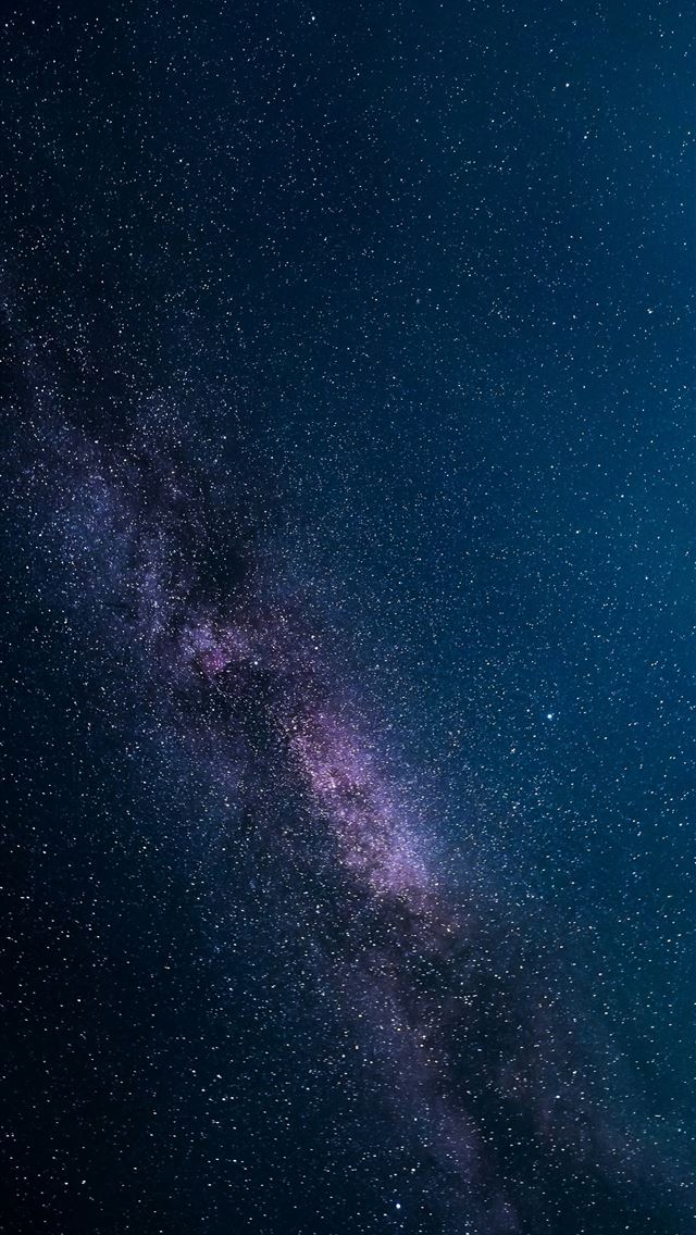 1290x2796 A bright blue light shines brightly in the night s... -  iPhone Wallpaper
