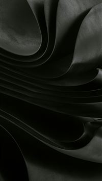 Dark flowing fabric creates a dramatic abstract ef... wallpaper