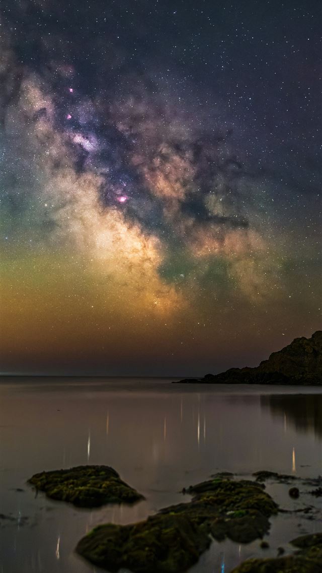 1290x2796 The milky way shines above the calm ocean  -  iPhone Wallpaper