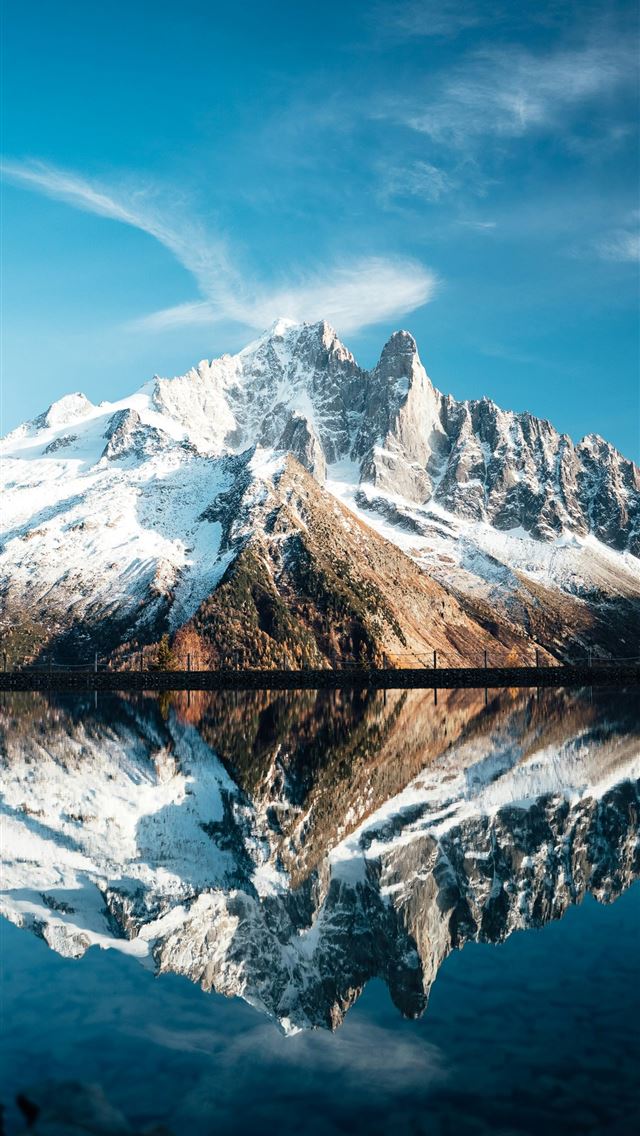 1290x2796 A mountain is reflected in the still water of a la... -  iPhone Wallpaper