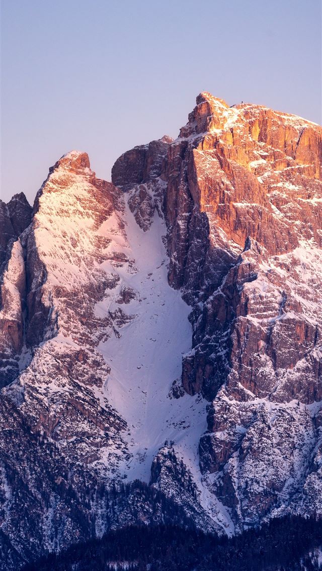 1290x2796 Snow capped mountain peaks illuminated by sunlight... -  iPhone Wallpaper