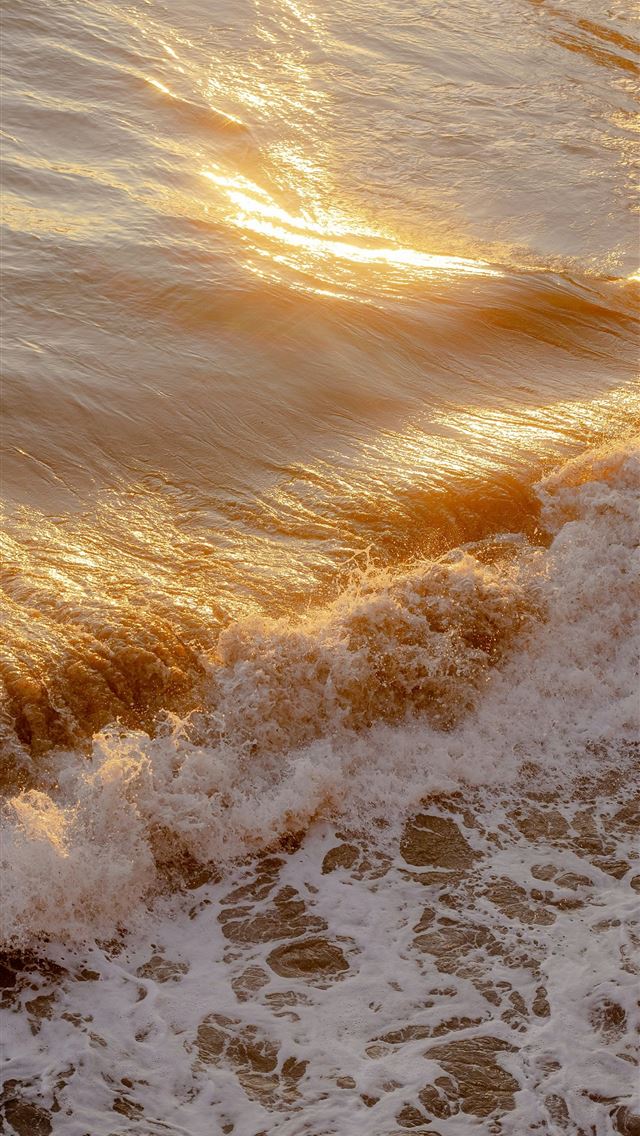 1290x2796 a person riding a surfboard on top of a wave -  iPhone Wallpaper