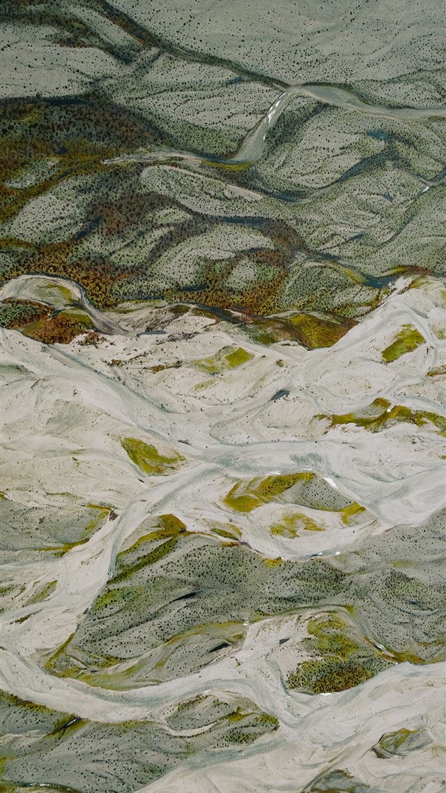 1290x2796 an aerial view of a snow covered mountain -  iPhone Wallpaper