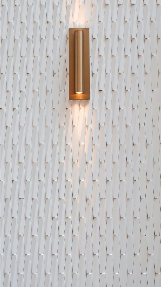 1290x2796 Modern wall sconce illuminating textured white wal... -  iPhone Wallpaper