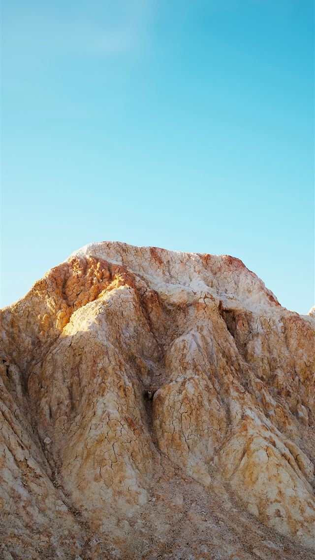 1290x2796 A view of a mountain range with a blue sky in the ... -  iPhone Wallpaper