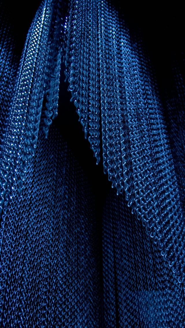 1290x2796 A close up of a blue tie on a black background -  iPhone Wallpaper