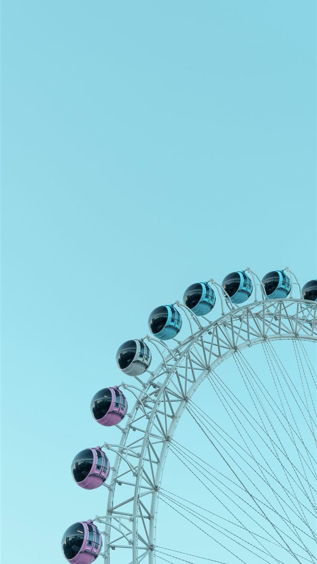 1290x2796 A ferris wheel with a blue sky in the background -  iPhone Wallpaper
