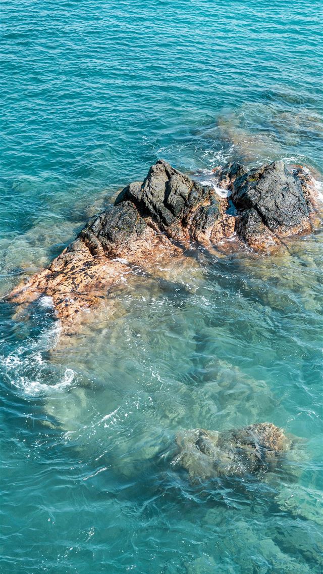 1290x2796 A rock in the middle of the ocean -  iPhone Wallpaper