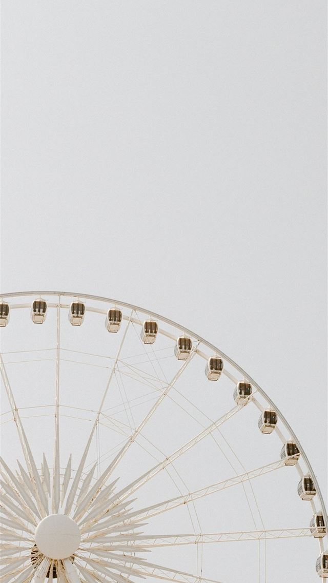 1290x2796 A white ferris wheel against a white background -  iPhone Wallpaper