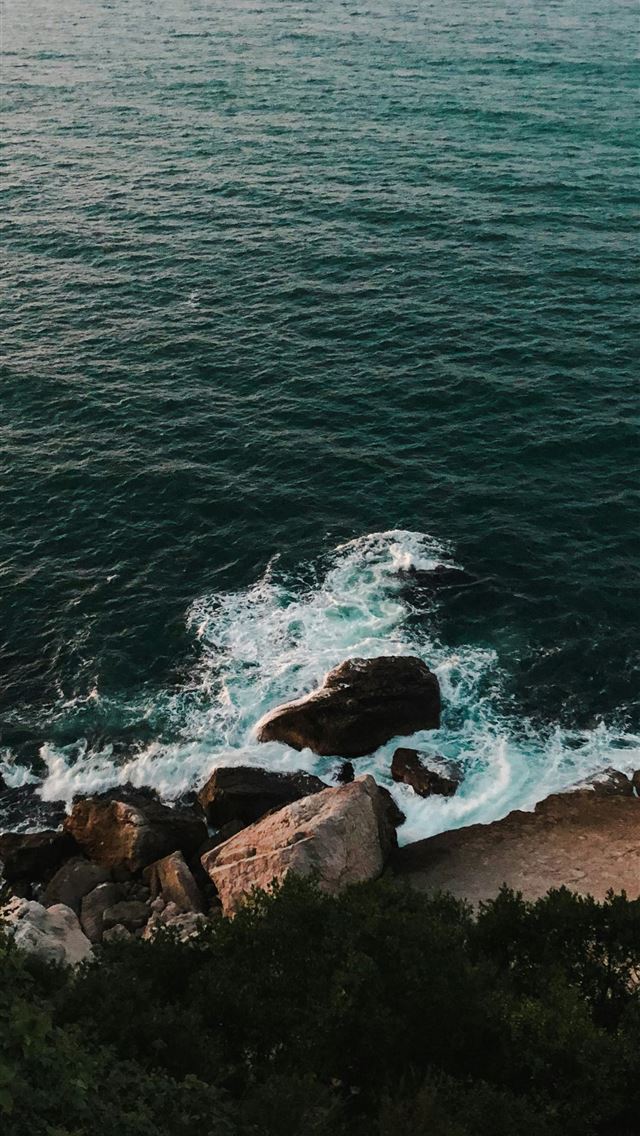 1290x2796 A view of the ocean from a cliff -  iPhone Wallpaper