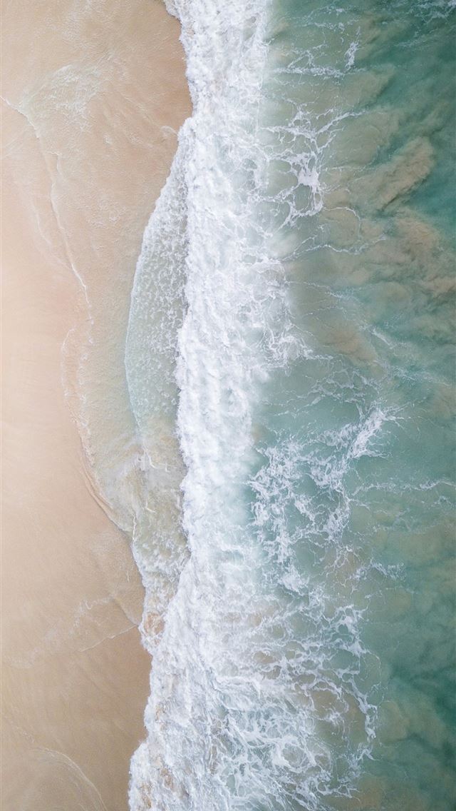 1290x2796 an aerial view of a beach and ocean -  iPhone Wallpaper