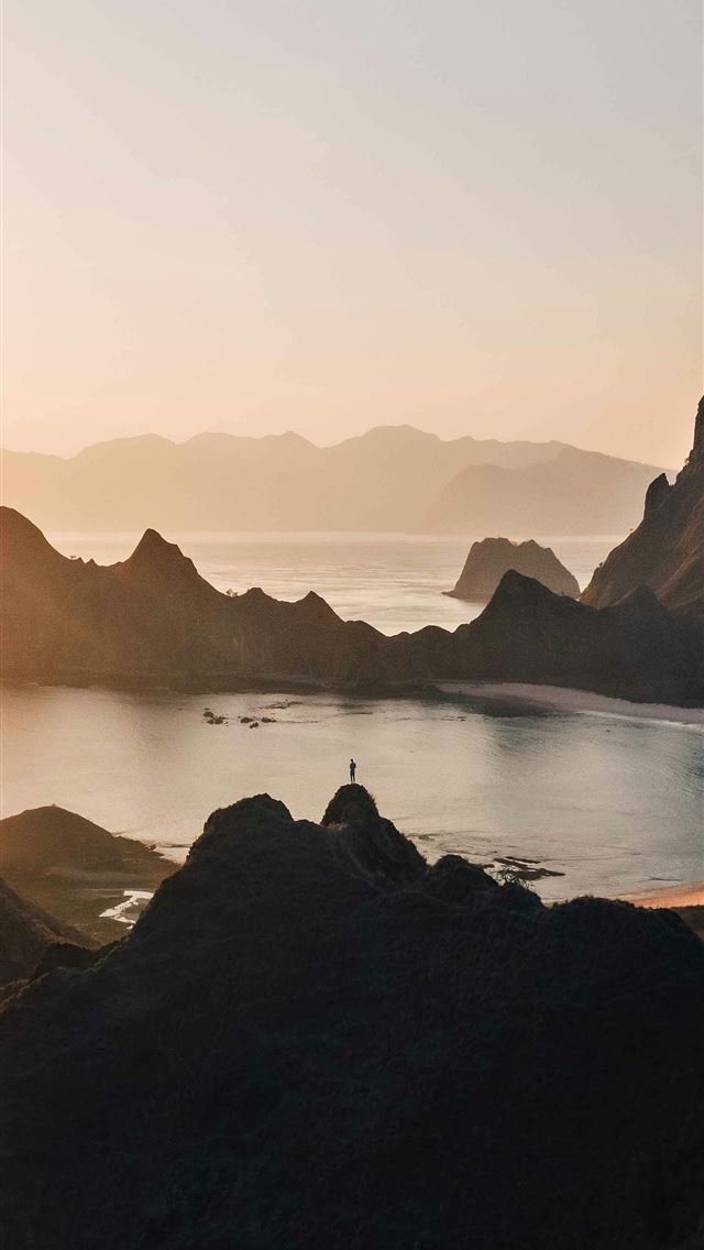1290x2796 black rock formation on sea during daytime -  iphone 14 Wallpaper