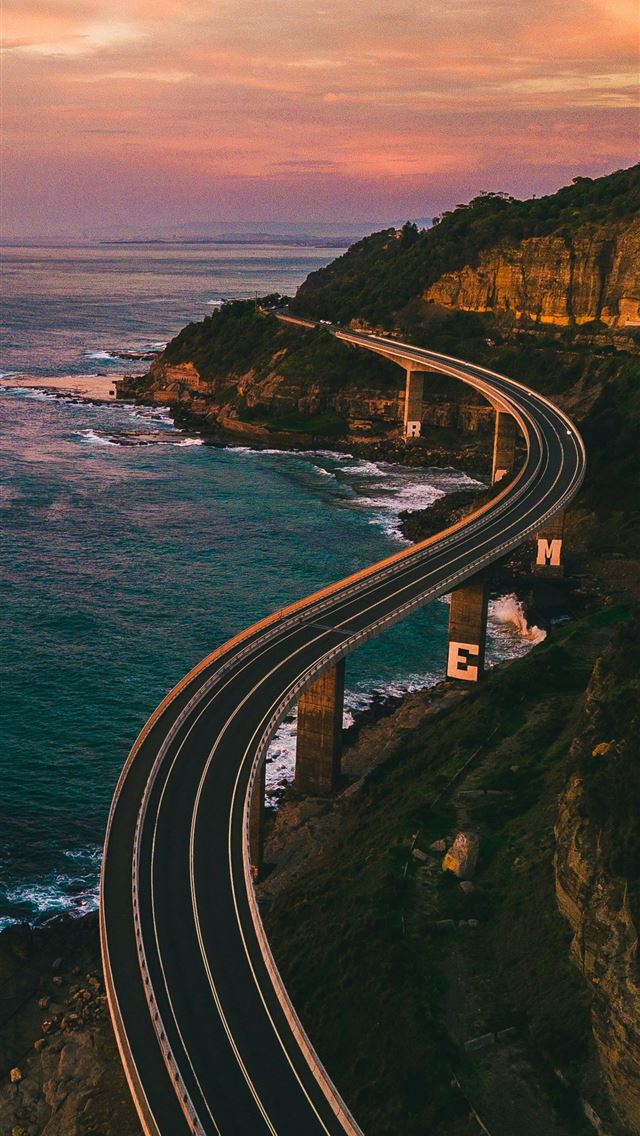 1290x2796 selective focus photography of empty road near bod... -  iPhone Wallpaper