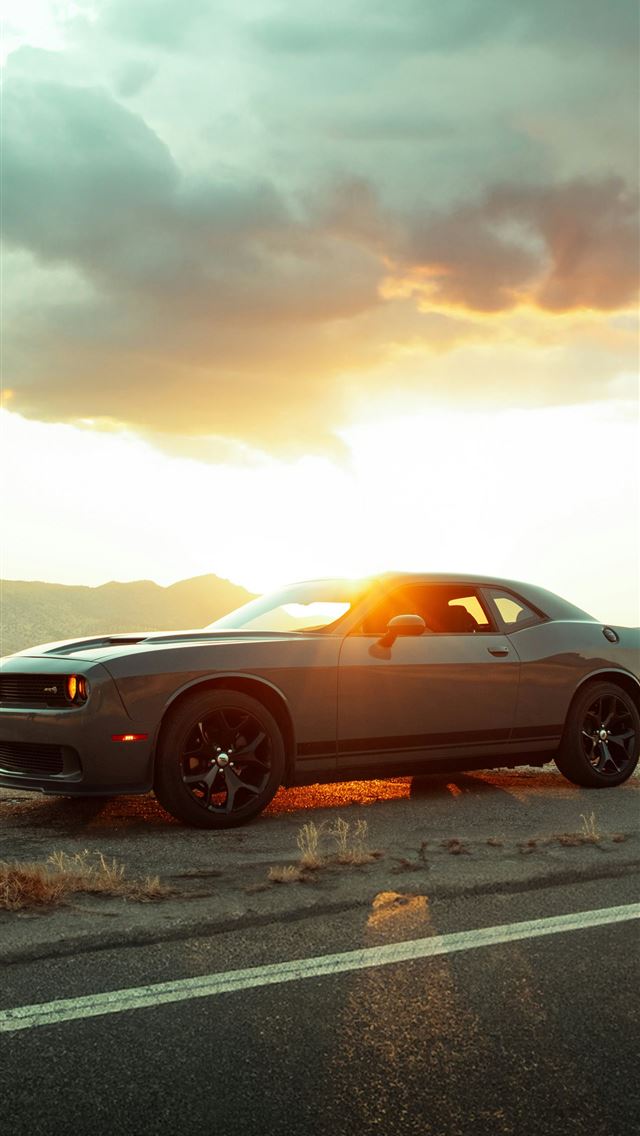 1290x2796 A car is parked on the side of the road -  iPhone Wallpaper
