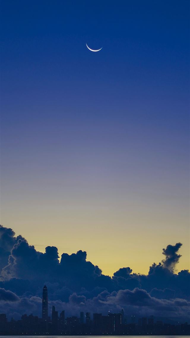1290x2796 A large body of water under a cloudy sky -  iPhone Wallpaper