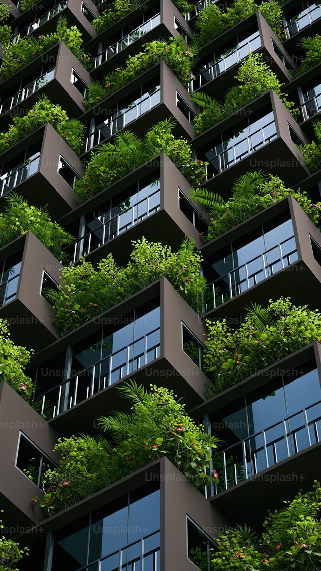 1290x2796 a very tall building with a bunch of windows -  iphone 14 Wallpaper