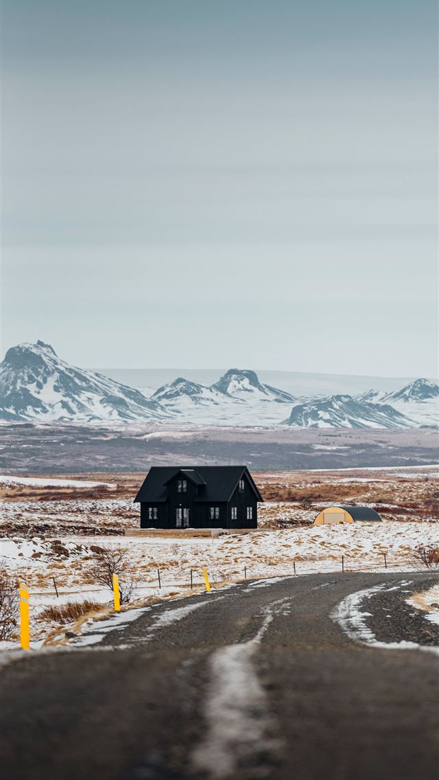 1290x2796 A road with a house in the middle of it -  iPhone Wallpaper