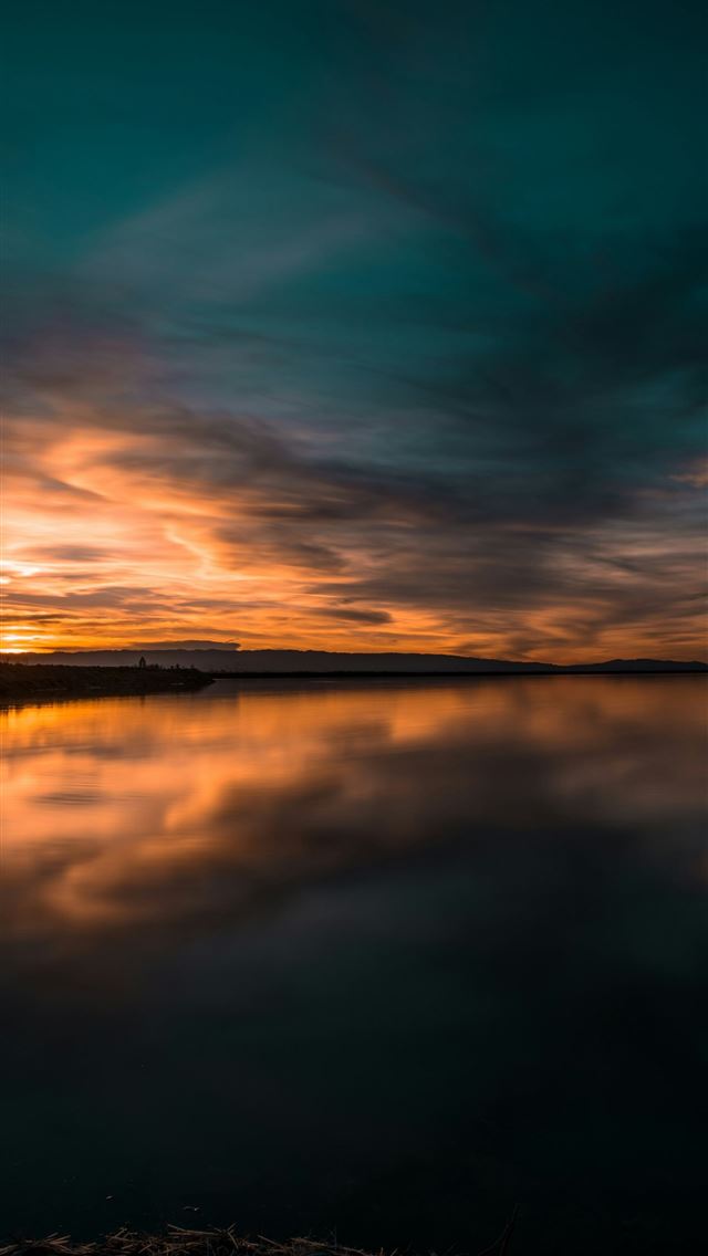 1290x2796 body of water under green sky -  iPhone Wallpaper