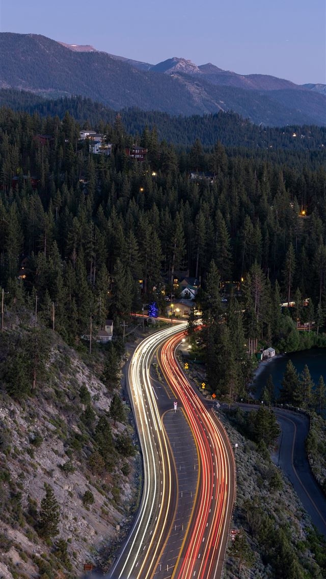 1290x2796 A long exposure shot of a highway going through th... -  iPhone Wallpaper