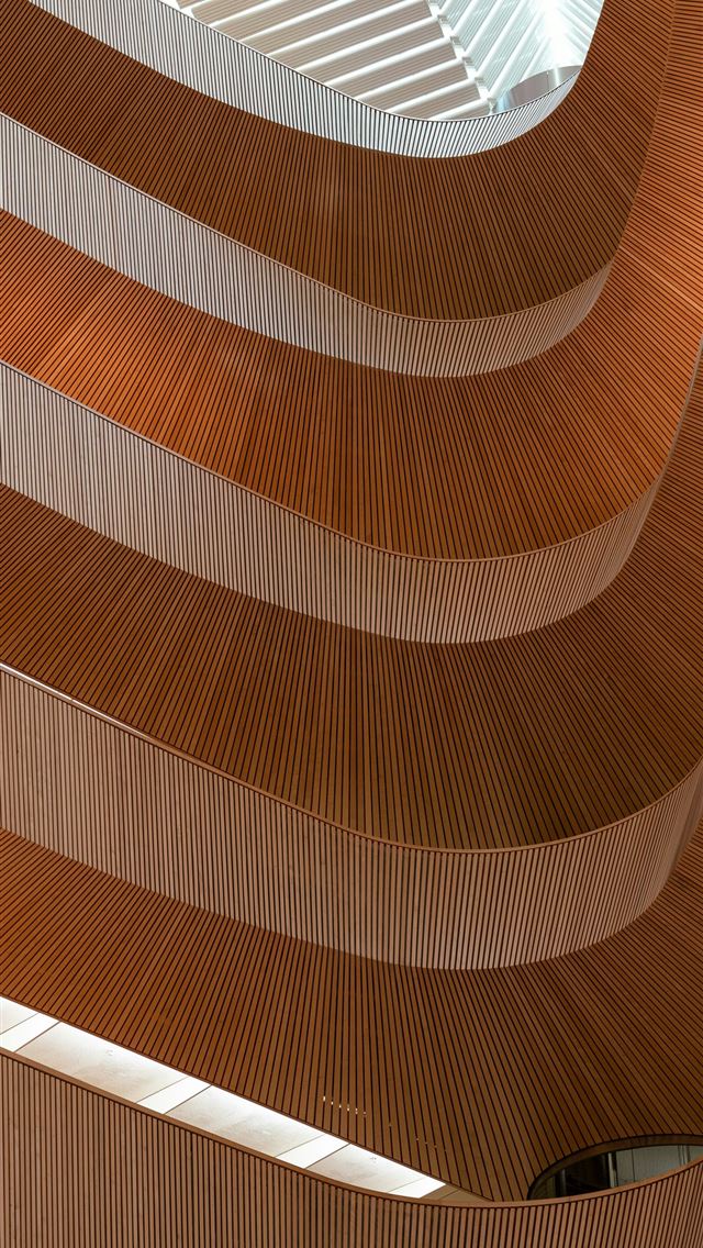 1290x2796 a building that has a curved wooden structure -  iPhone Wallpaper