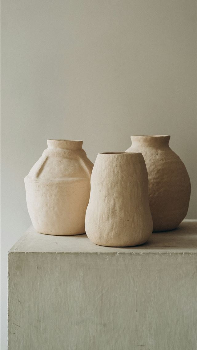 1290x2796 3 brown clay vases on white concrete table -  iPhone Wallpaper