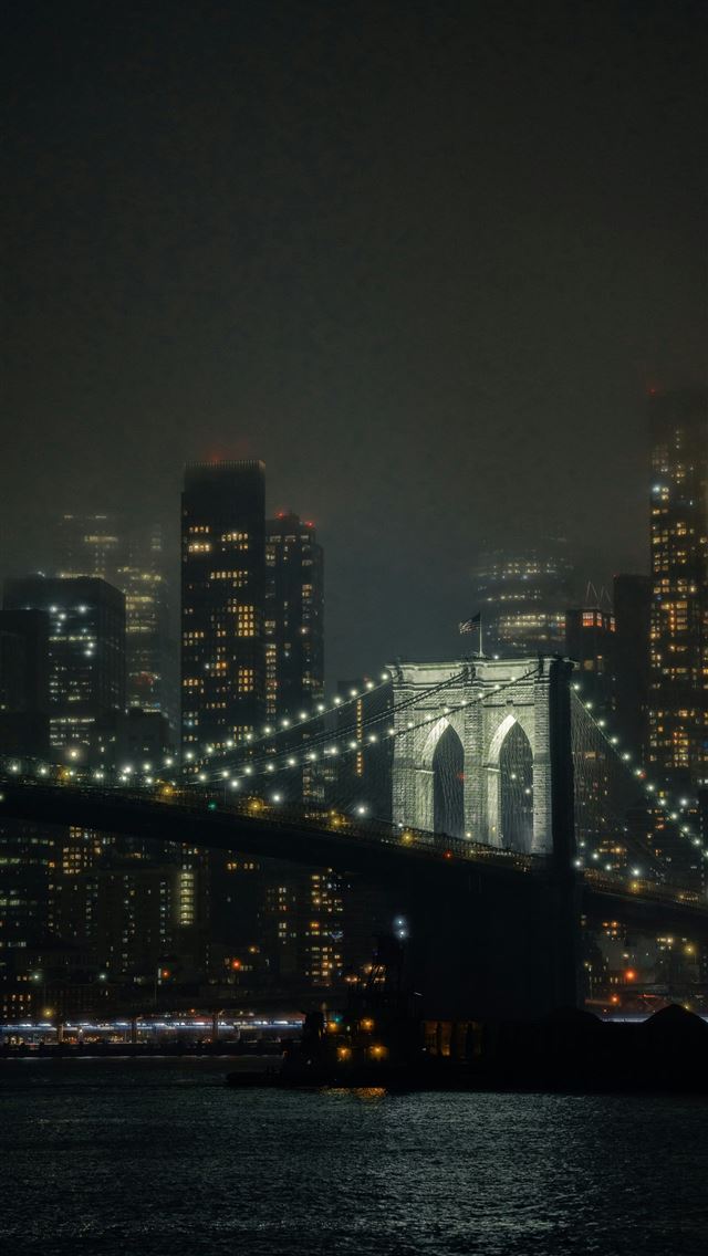 1290x2796 a view of the brooklyn bridge at night -  iPhone Wallpaper