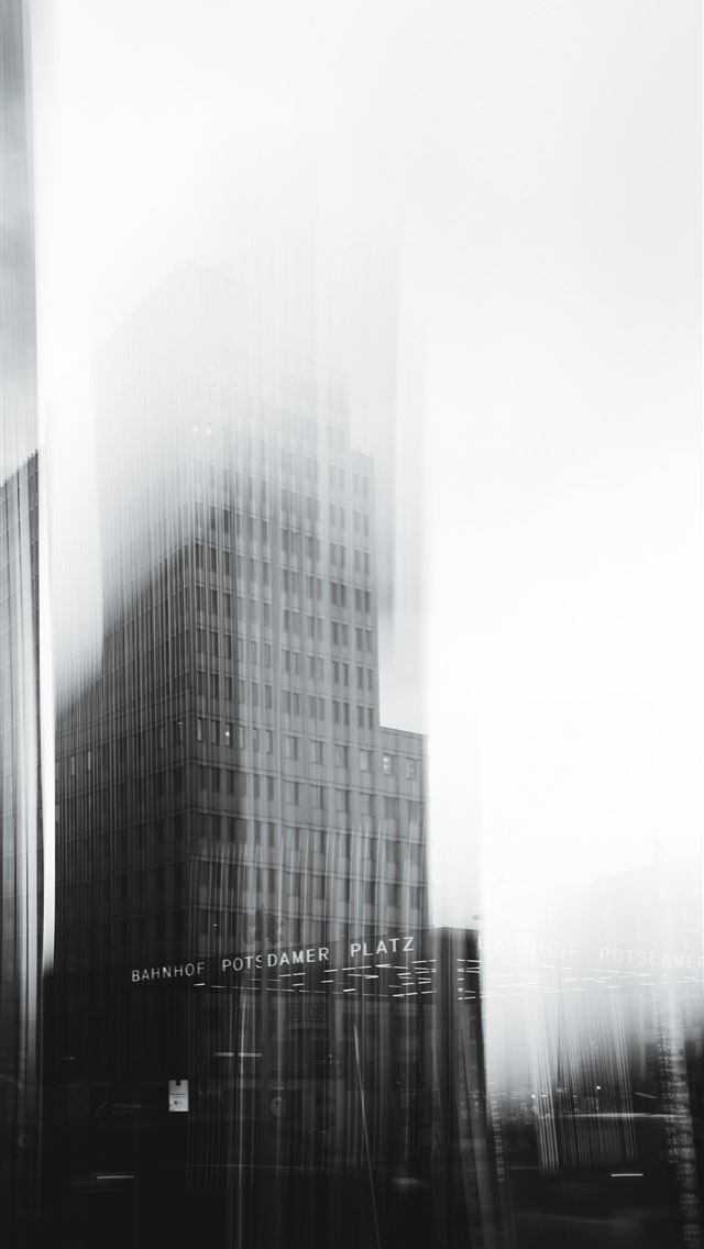 1290x2796 a black and white photo of tall buildings -  iPhone Wallpaper