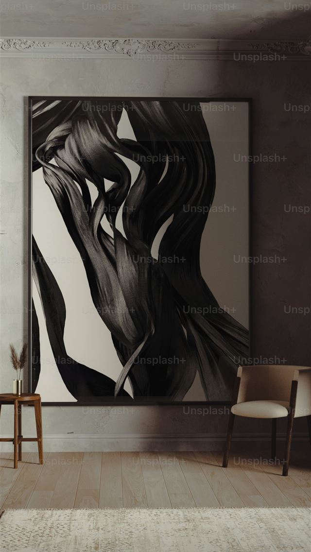 1290x2796 a chair and a painting in a room -  iPhone Wallpaper