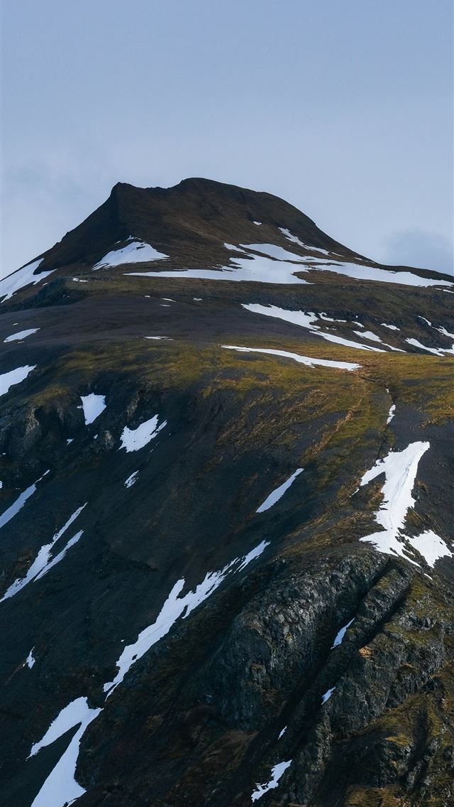 1290x2796 a very tall mountain covered in lots of snow -  iPhone Wallpaper