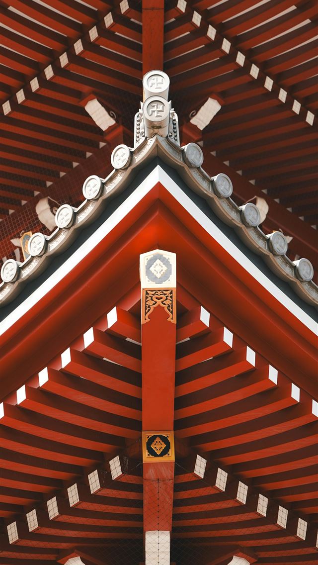 1290x2796 a red and white building with a clock on it's side -  iPhone Wallpaper