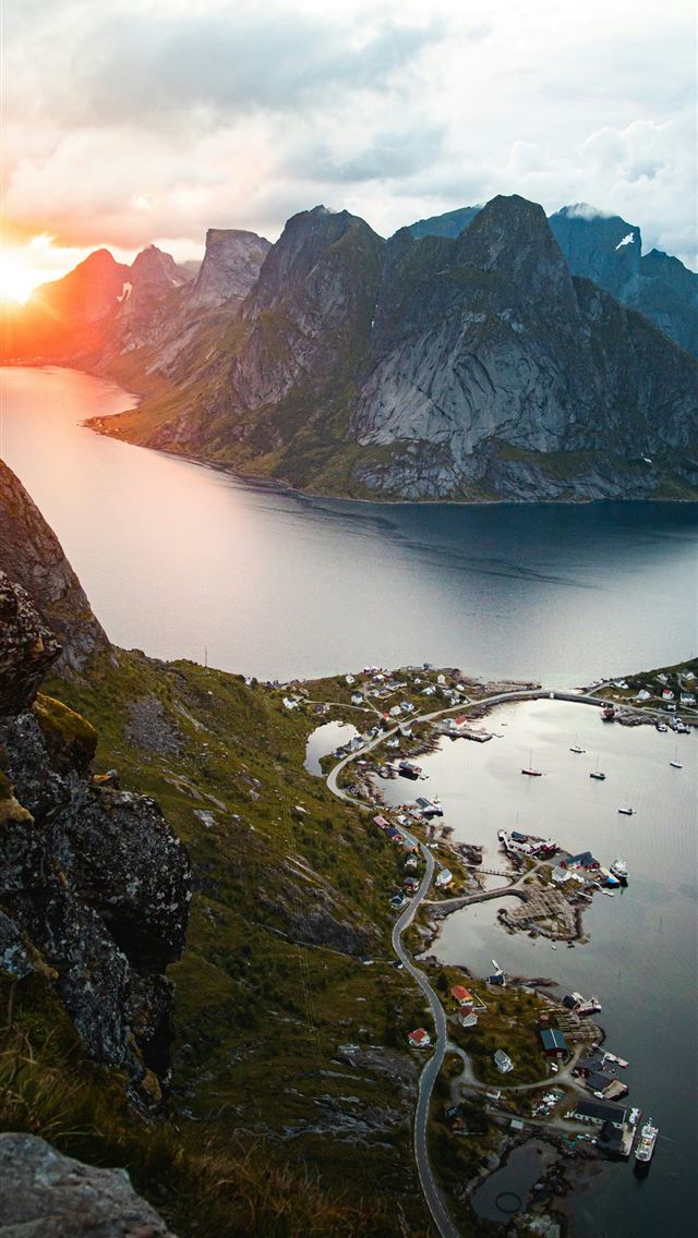 1290x2796 body of water between mountains during daytime -  iPhone Wallpaper