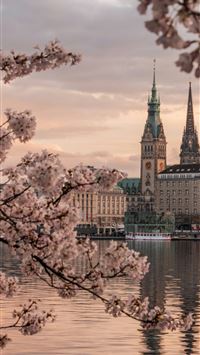 a beautiful view of a large building with a clock ... wallpaper