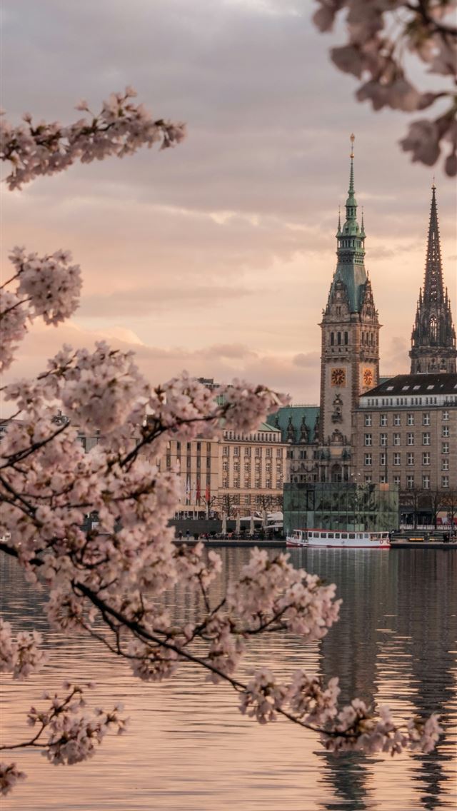 1290x2796 a beautiful view of a large building with a clock ... -  iPhone Wallpaper