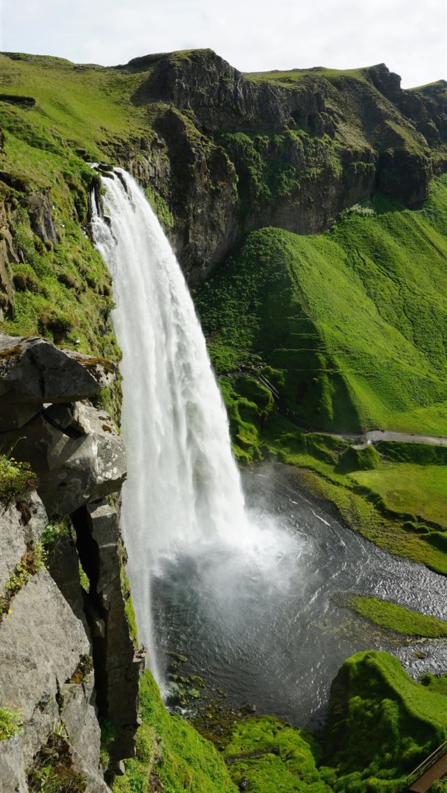 1290x2796 a large waterfall with a large amount of water com... -  iPhone Wallpaper