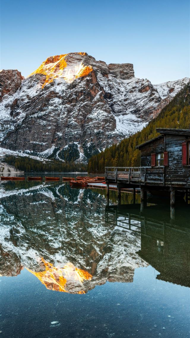 1290x2796 A mountain range is reflected in the still water o... -  iPhone Wallpaper