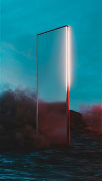 a large mirror sitting in the middle of a body of ... wallpaper