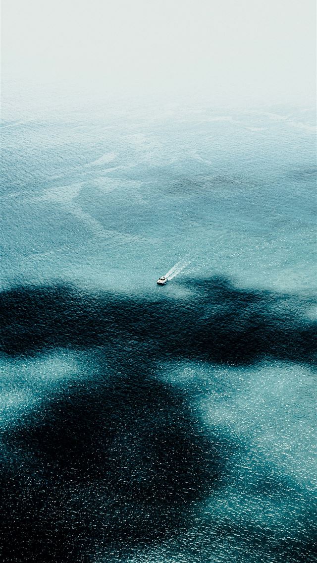 1290x2796 the shadow of a boat on the water -  iPhone Wallpaper