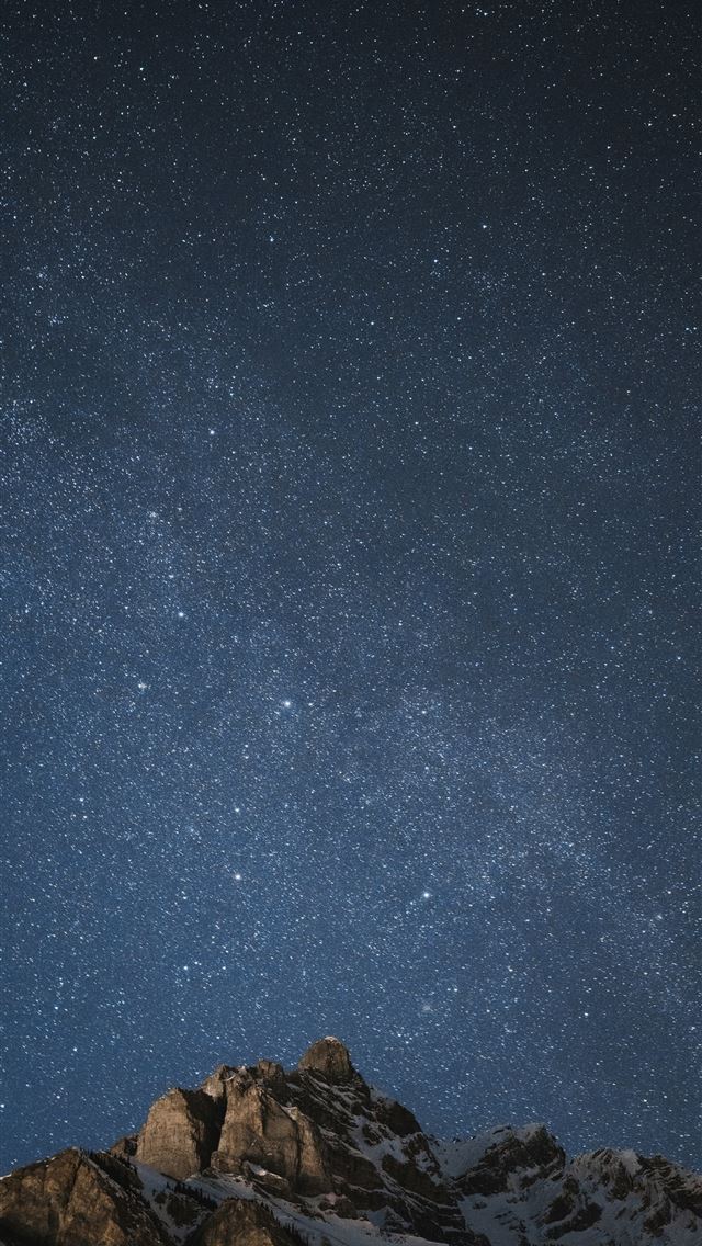 1290x2796 brown rock formation under blue sky during night t... -  iPhone Wallpaper