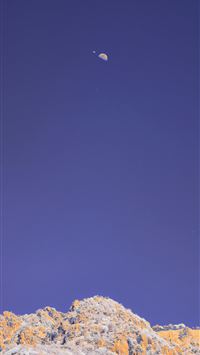 a view of the top of a mountain from below wallpaper