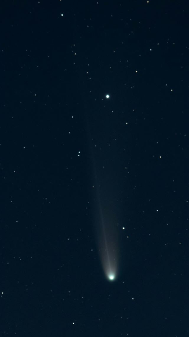 1290x2796 A comet with a long tail in the night sky  - stars iPhone Wallpaper