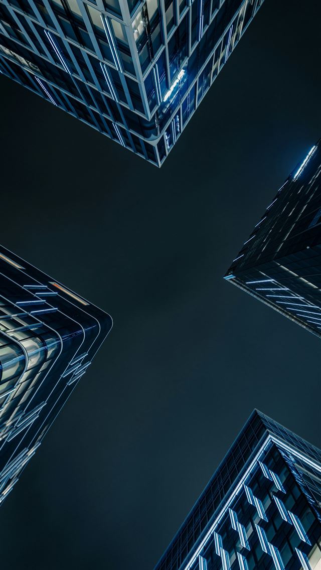 1290x2796 Modern skyscrapers viewed from below at night  -  iPhone Wallpaper