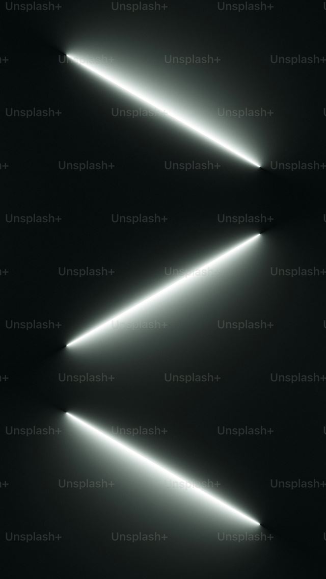 1290x2796 a black and white photo of a light in the dark -  iPhone Wallpaper