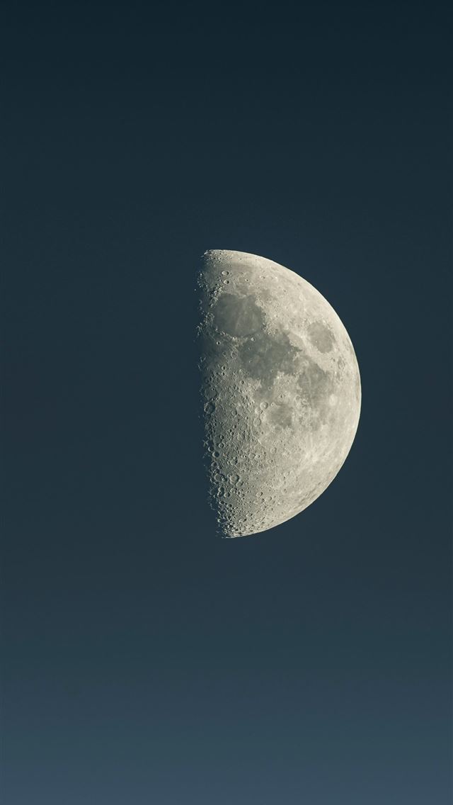 1290x2796 a half moon is seen in the sky -  iPhone Wallpaper