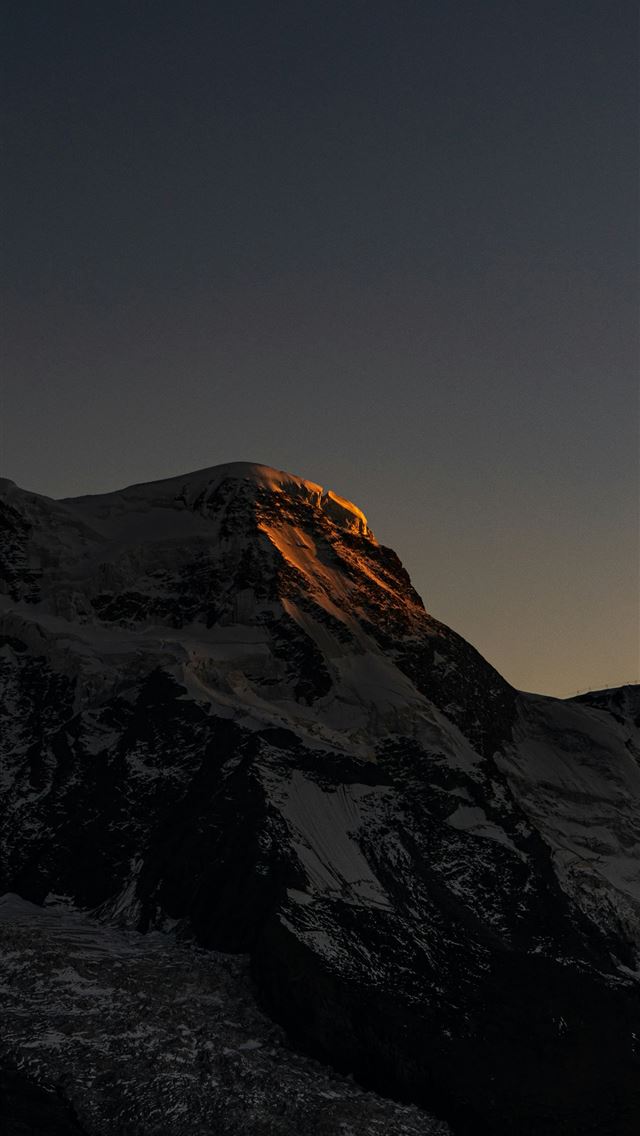 1290x2796 a very tall mountain covered in snow under a dark ... - scenery iPhone Wallpaper