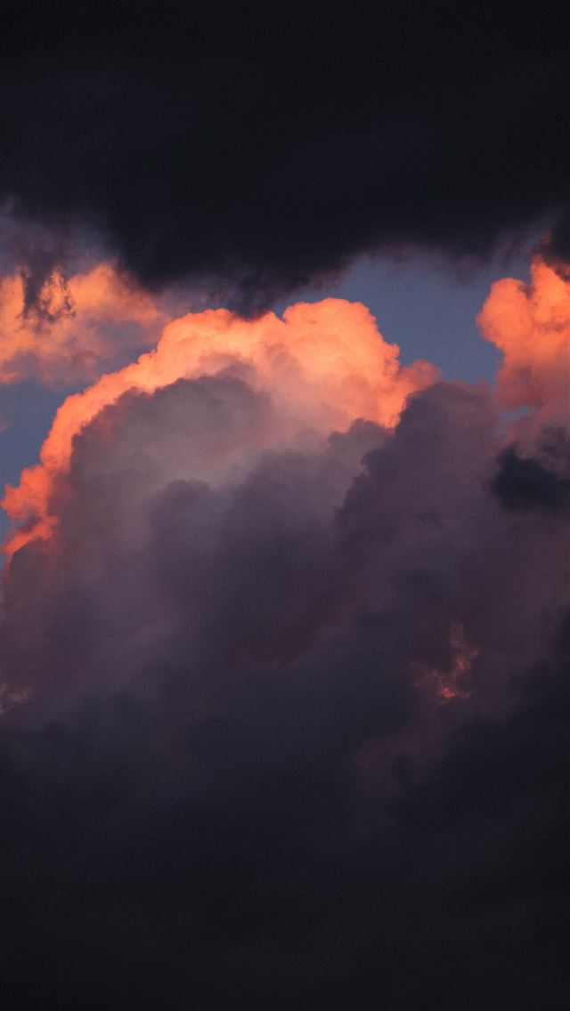 1290x2796 Dramatic sunset clouds with vibrant orange glow - sunset iPhone Wallpaper