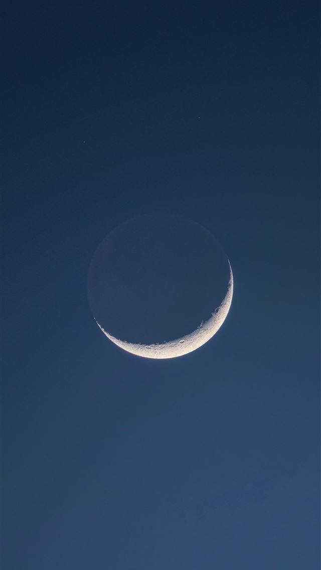 1290x2796 a crescent moon in a clear blue sky -  iPhone Wallpaper